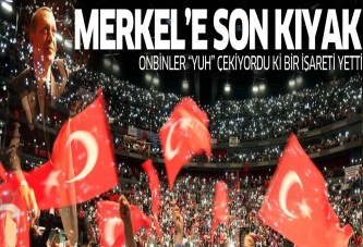 Başbakan Erdoğan Köln'de Merkel'i yuhalatmadı