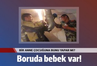 Bebeğini borunun içine bıraktı