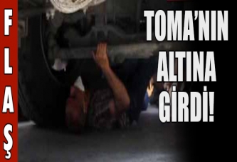 Eylemci TOMA'nın altına girdi!